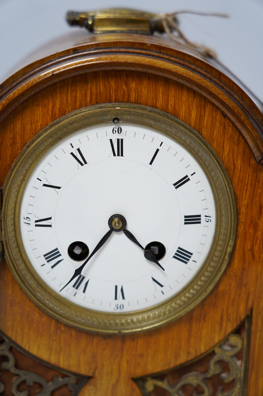 A 19th century mahogany eight day mantel clock with enamel dial and pendulum, 30cm high. Condition - fair, not tested